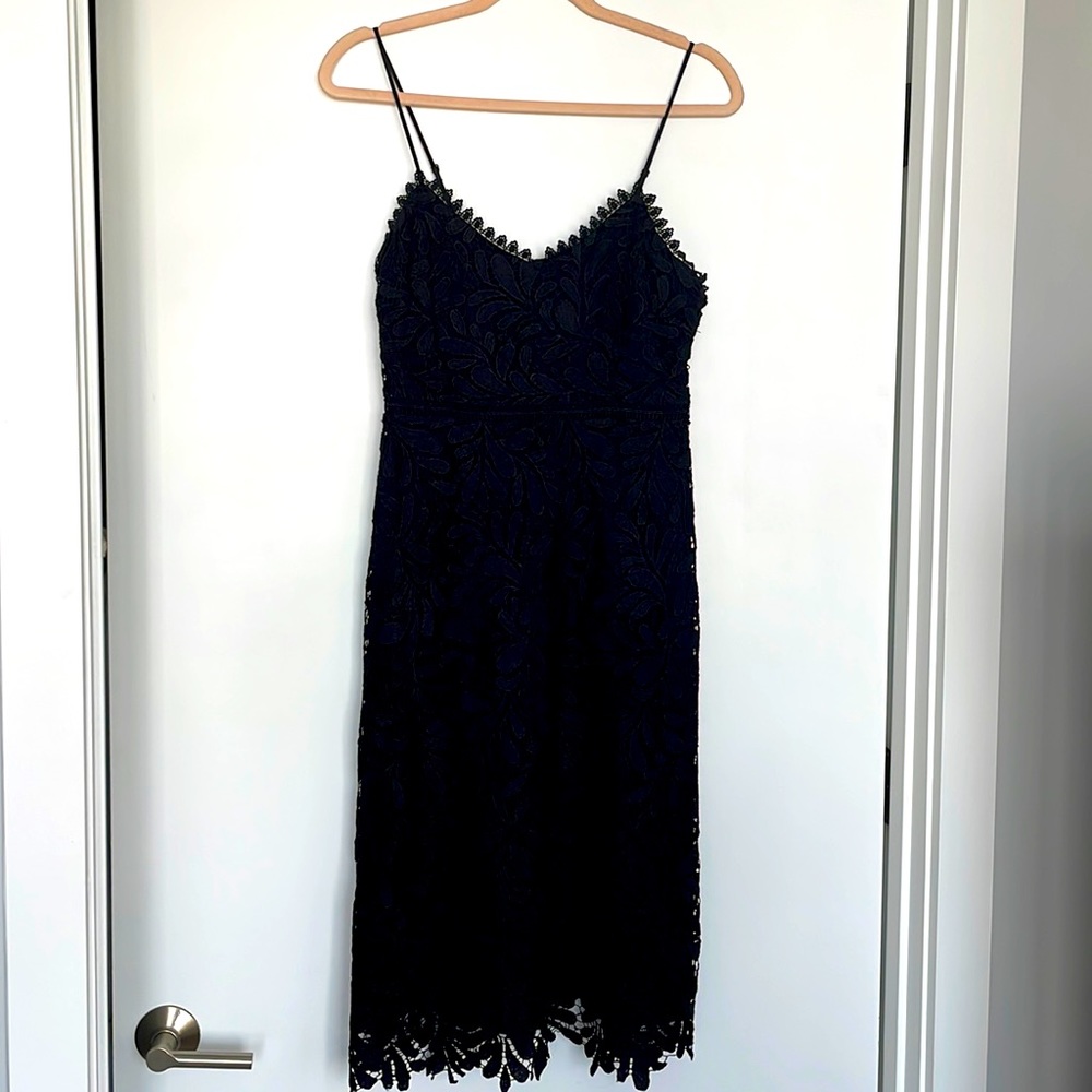 Like new Black cocktail dress by Guess, size 4. Worn once.